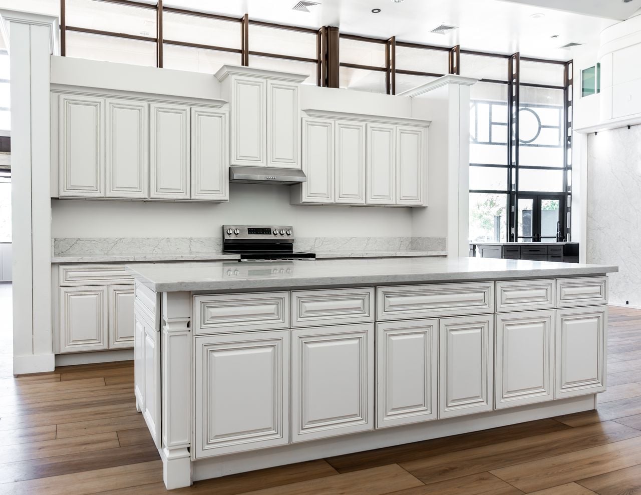 Antique White kitchen cabinetry in a completed room